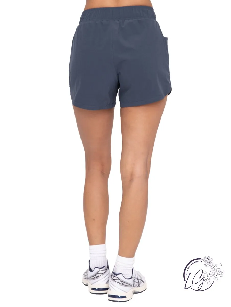 Flex Flow Curved Hem Shorts